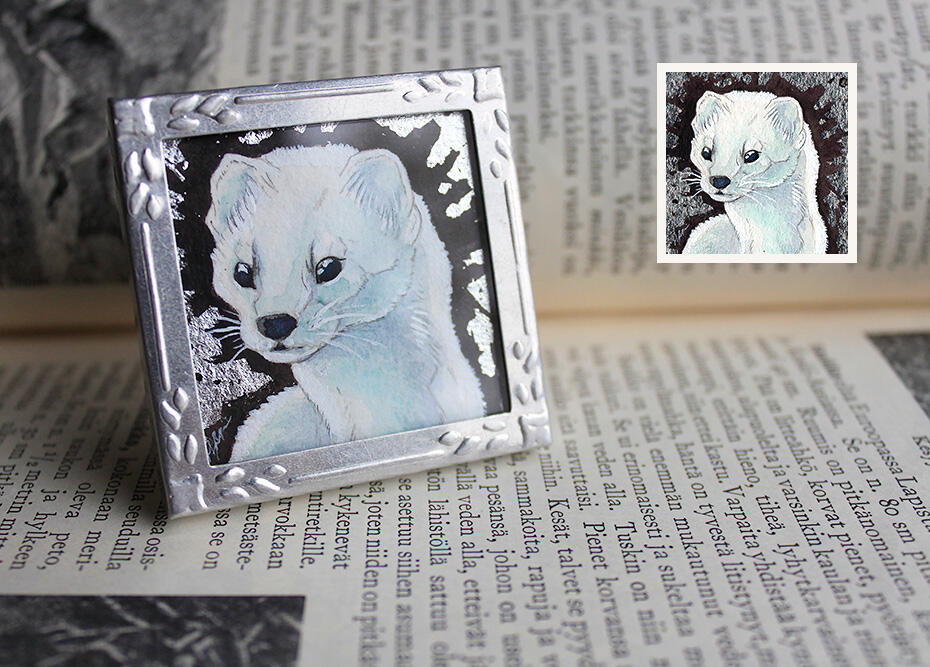 Traditionally painted artwork depicting an ermine. Artwork has been framed in a vintage photo frames.